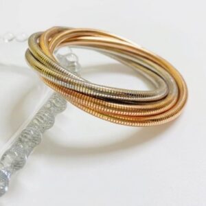gold multi tone coil bangle