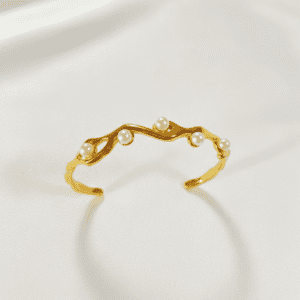 18k gold plated organic wave pearl bangle.