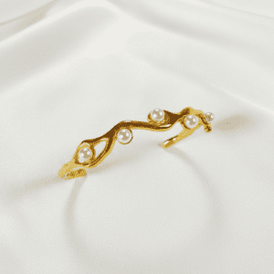 18k gold plated organic wave pearl bangle.