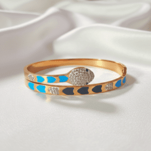 the serpentine elegance: gold tone enamel & crystal snake bangle