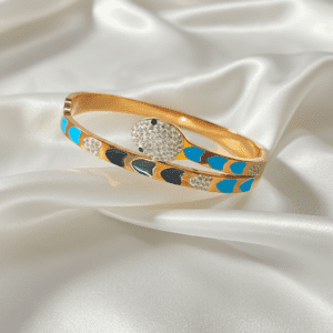 the serpentine elegance: gold tone enamel & crystal snake bangle the serpentine elegance: gold tone enamel & crystal snake bangle