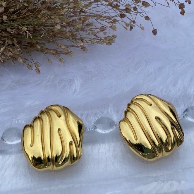 bold golden teardrop stud earrings bold golden teardrop stud earrings