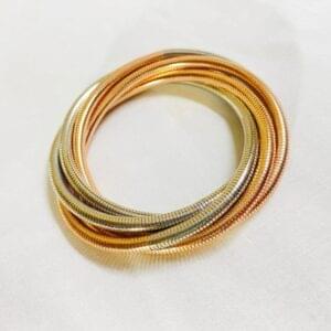 Home gold multi tone coil bangle
